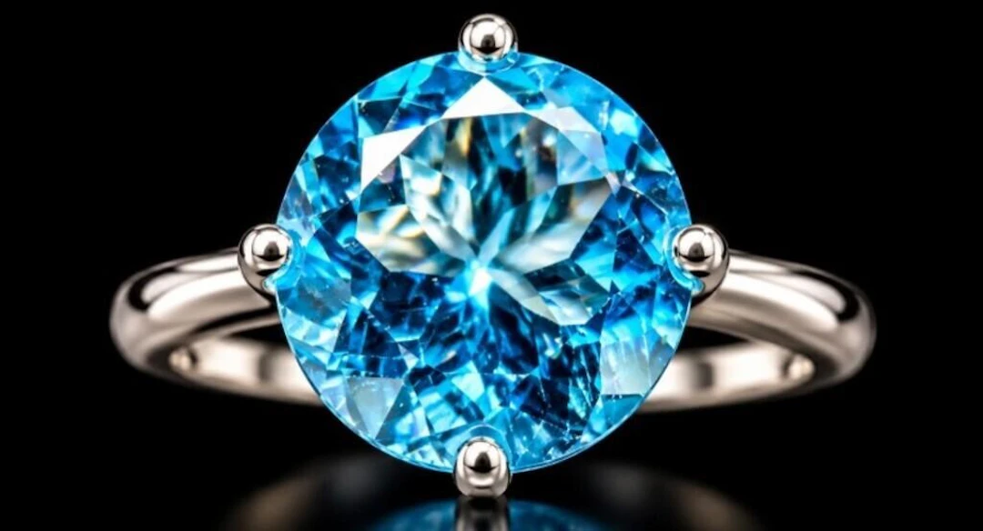$2400, 10k(1.85g), blue topaz (2.37ct)ring, size 6