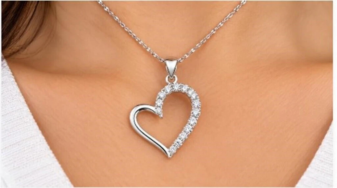 $1800, 10k(0.8g), diamond (0.15ct)pendant, retail
