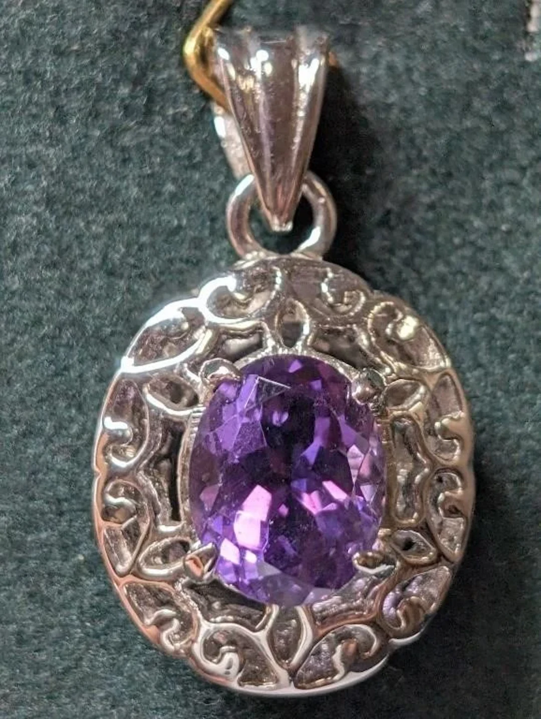 $100, Silver(3.82g), Amethyst (3ct)Pendant, apprai