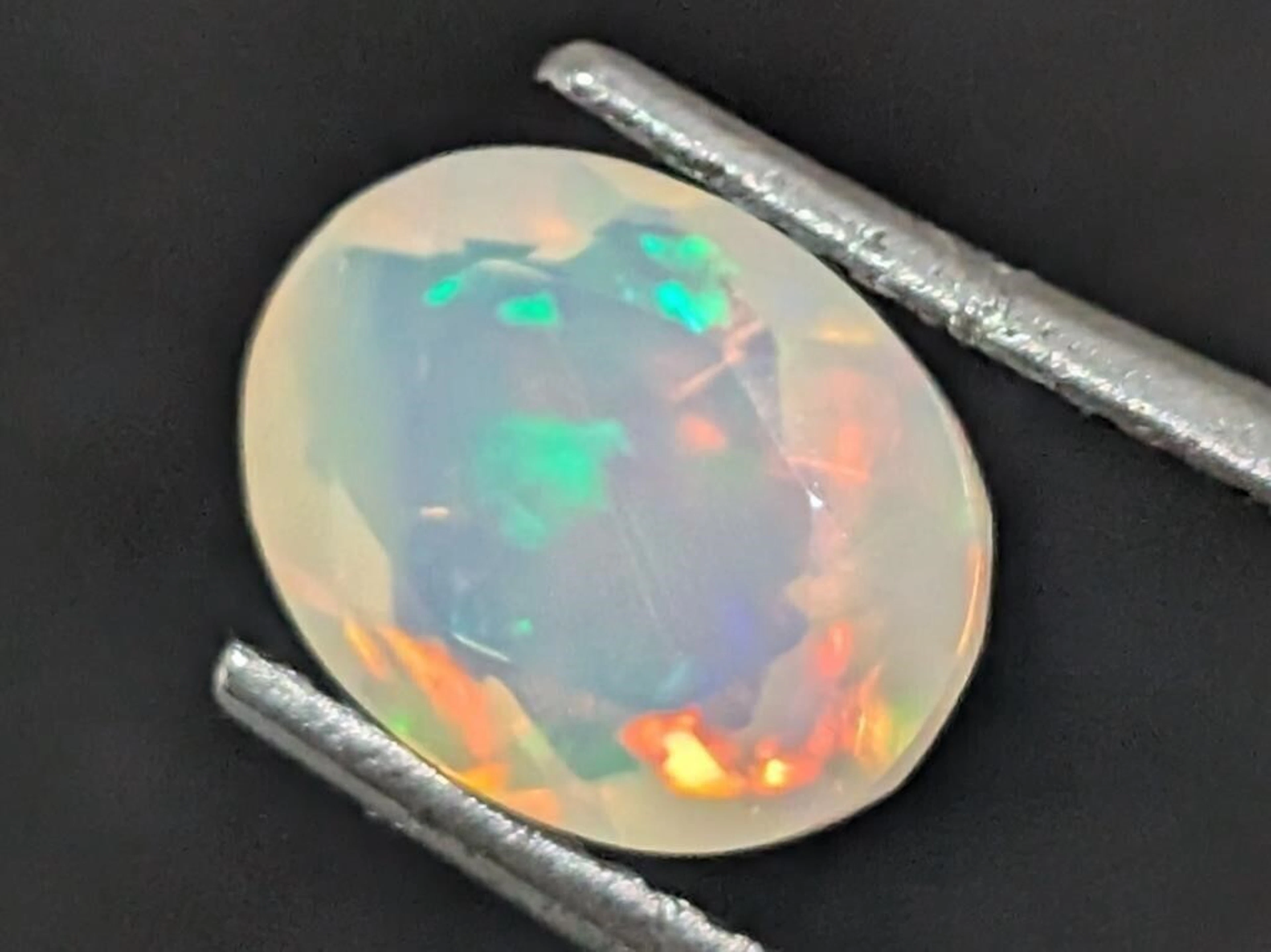 $200, genuine opal (1.7ct)gemstone, retail value $