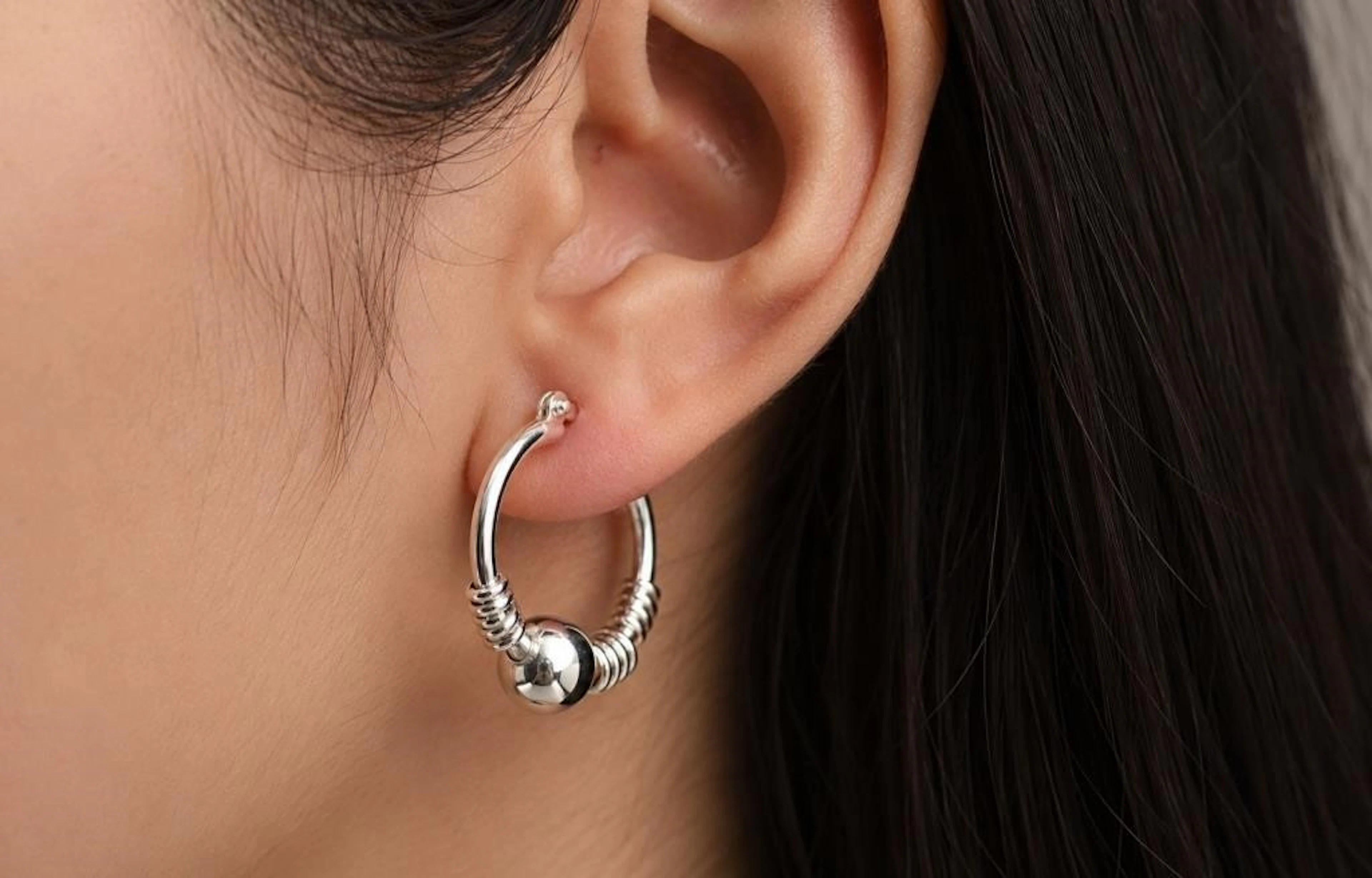 $60, silver(0.78g), earring, retail value $60
