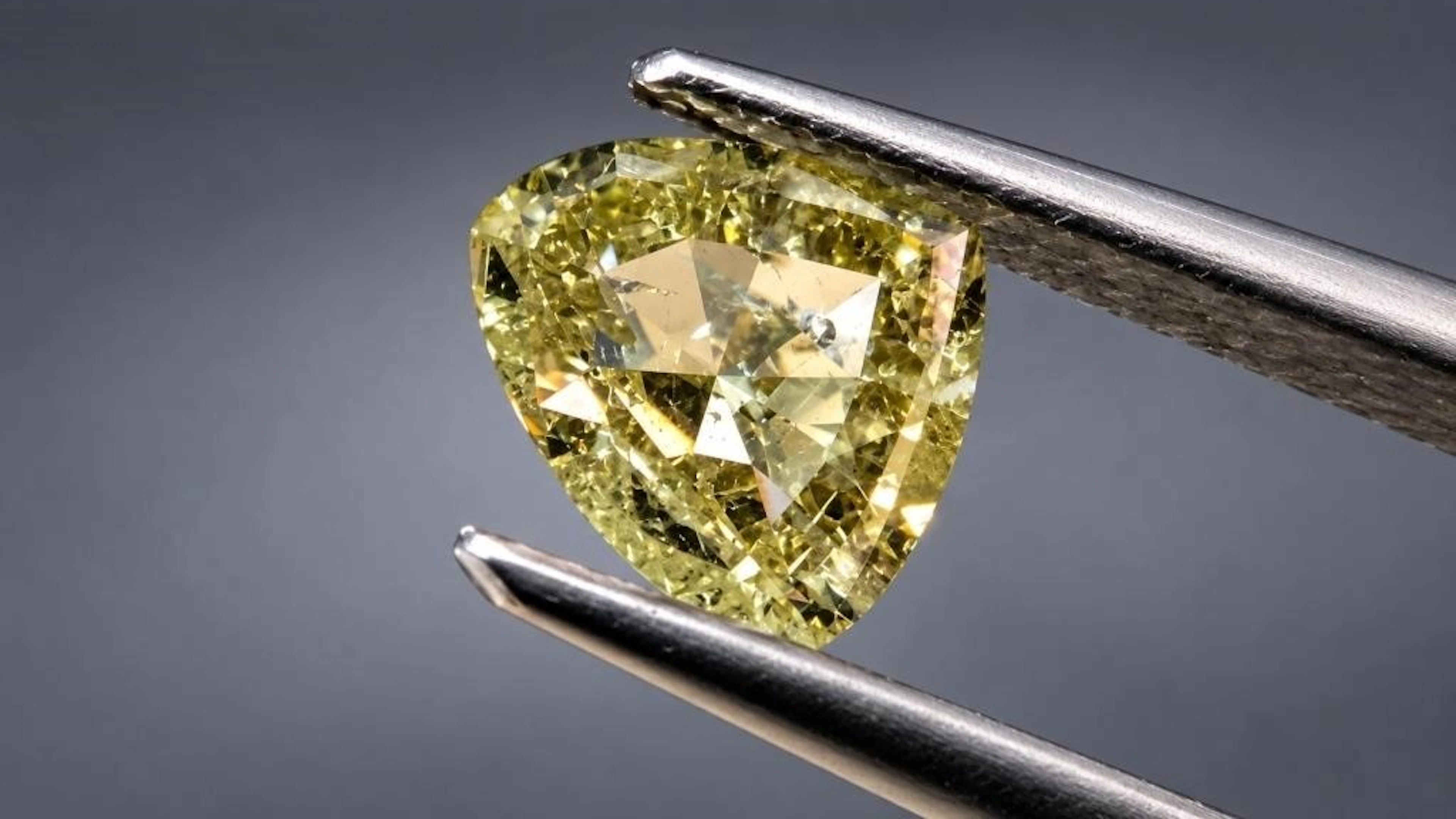 $2400, natural diamond (0.6ct)gemstone, retail val