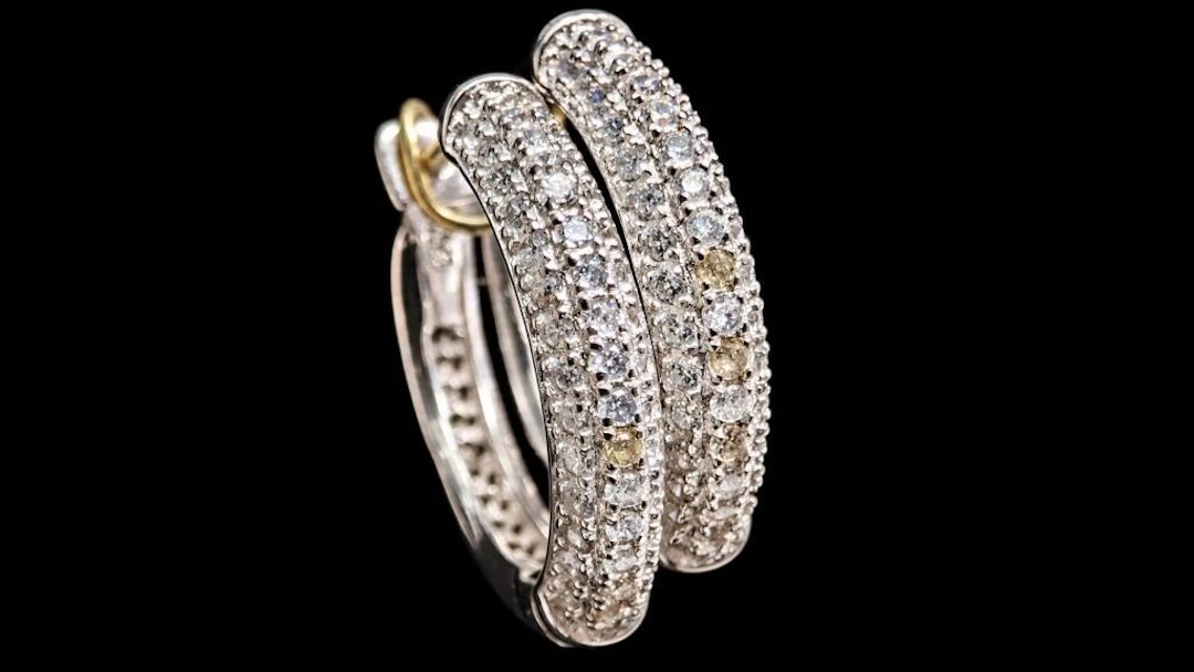 $200, silver(5.4g), CZearring, retail value $200
