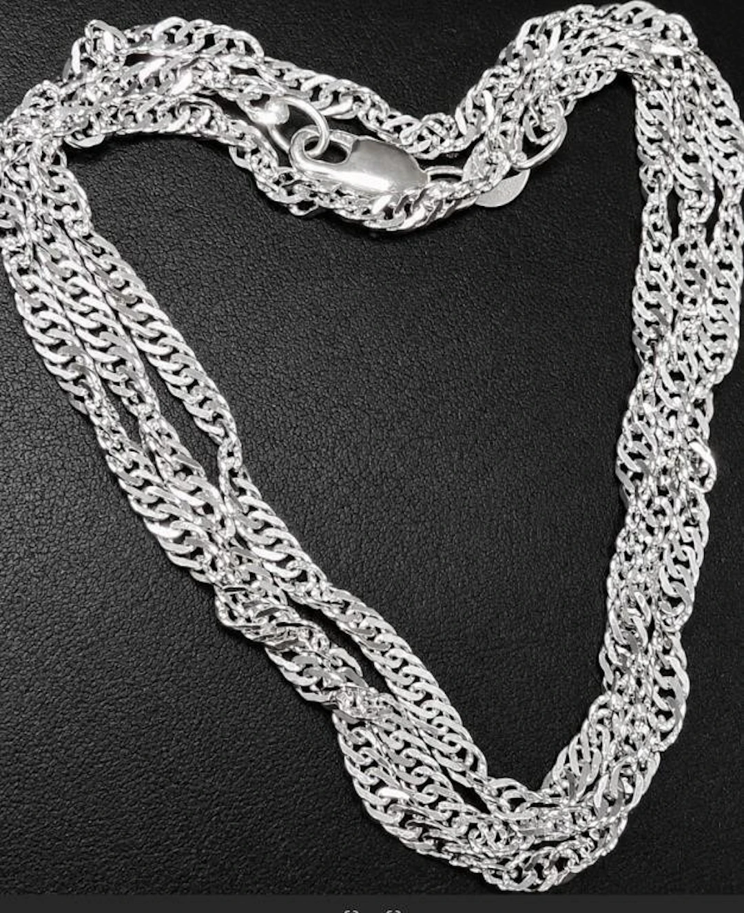 $250, silver(8.5g), singaore chain 20", MSRP $25