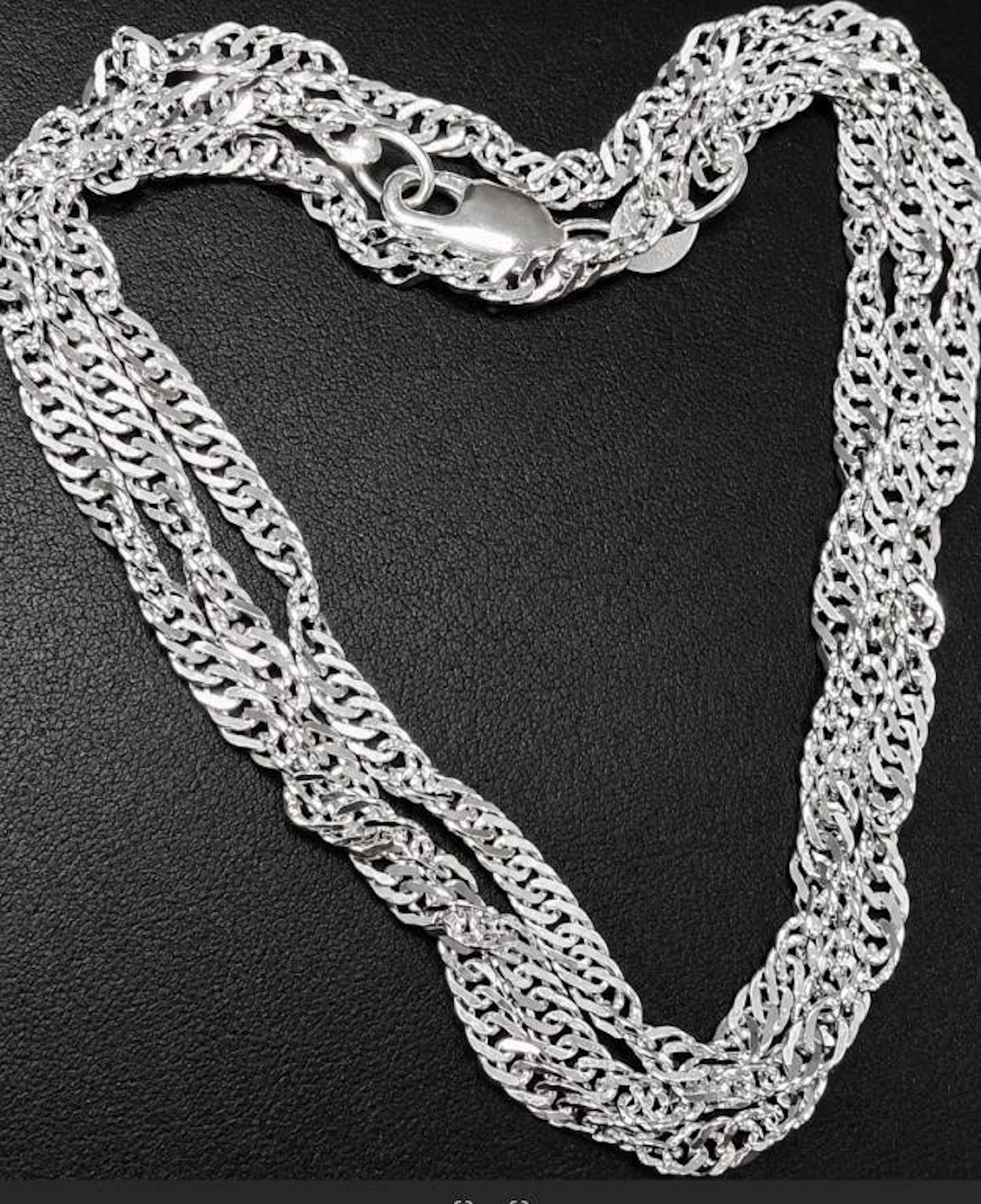 $250, silver(8.5g), singaore chain 20", MSRP $25