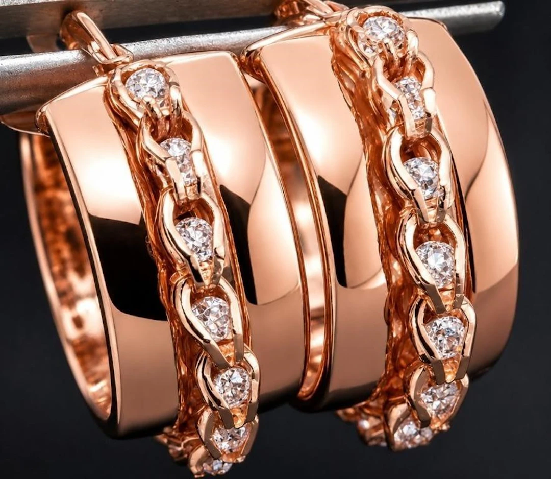 $1600, 10k(2.37g), dancing crystal earring, retai