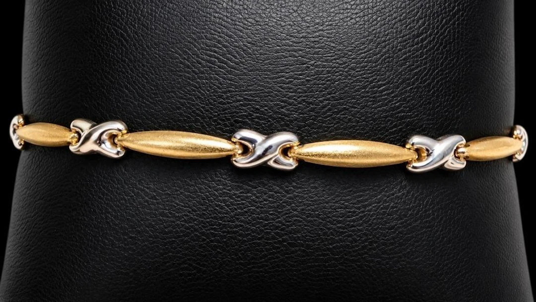 $2200, 10k(3.33g), bracelet 7.5", retail value $2