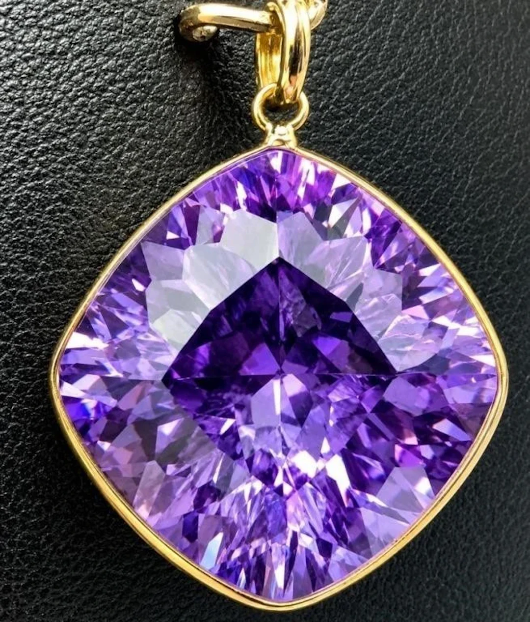 $1000, 10k(3.1g), amethyst (14.2ct) pendant, reta