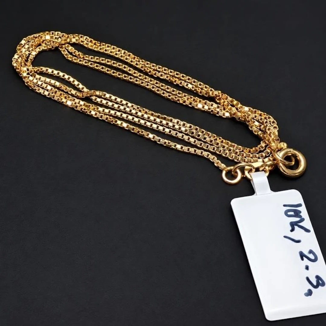 $1800, 10k(2.5g), Chain, 18.5 inches long, retail