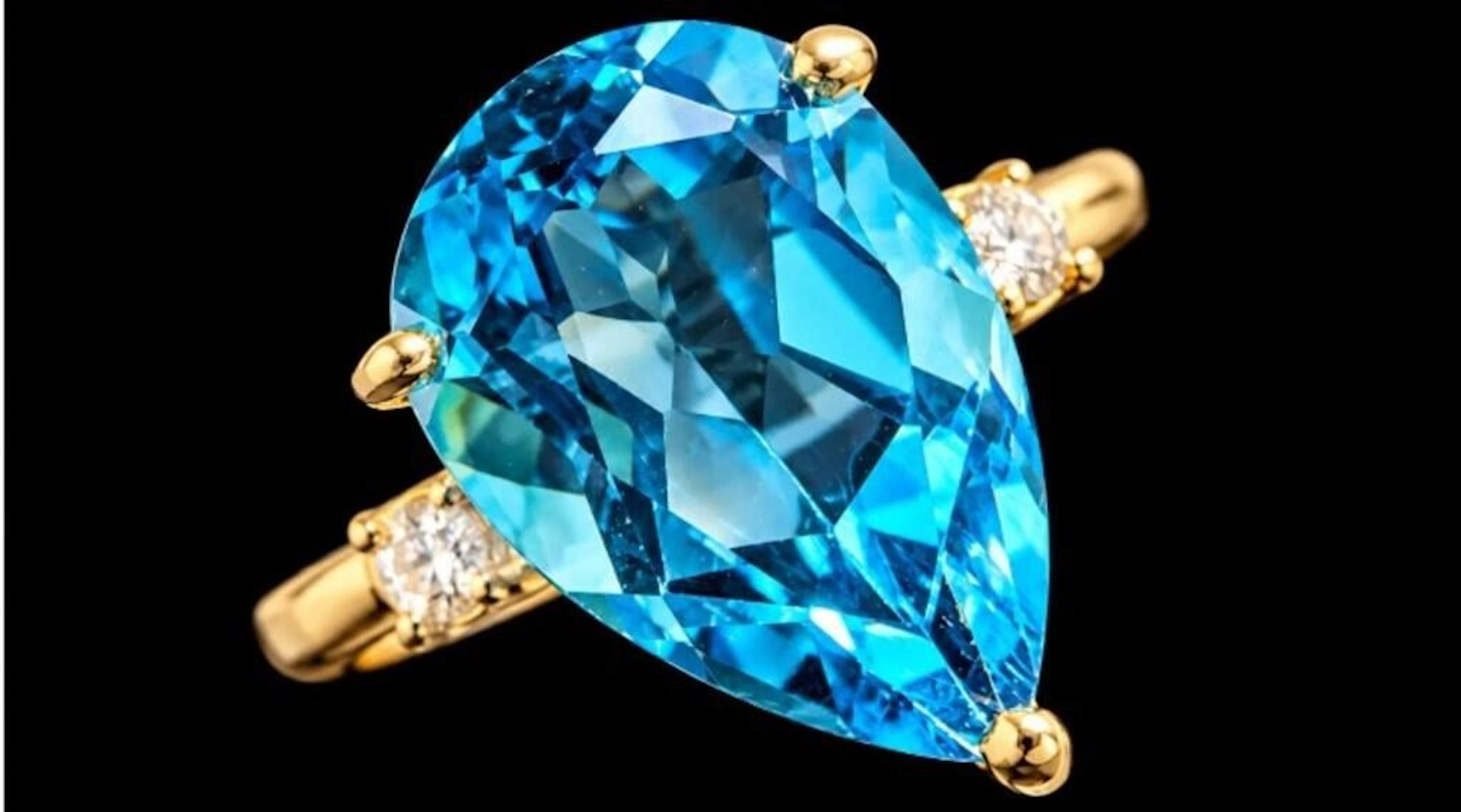 $2600, 10k(1.9g), blue topaz (3ct), diamond (0.03c