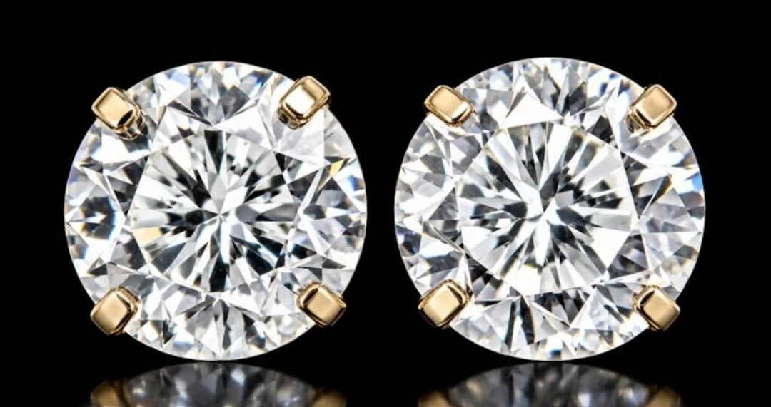 $1000, 14k(0.41g), lab diamond (0.84ct)earing, ret