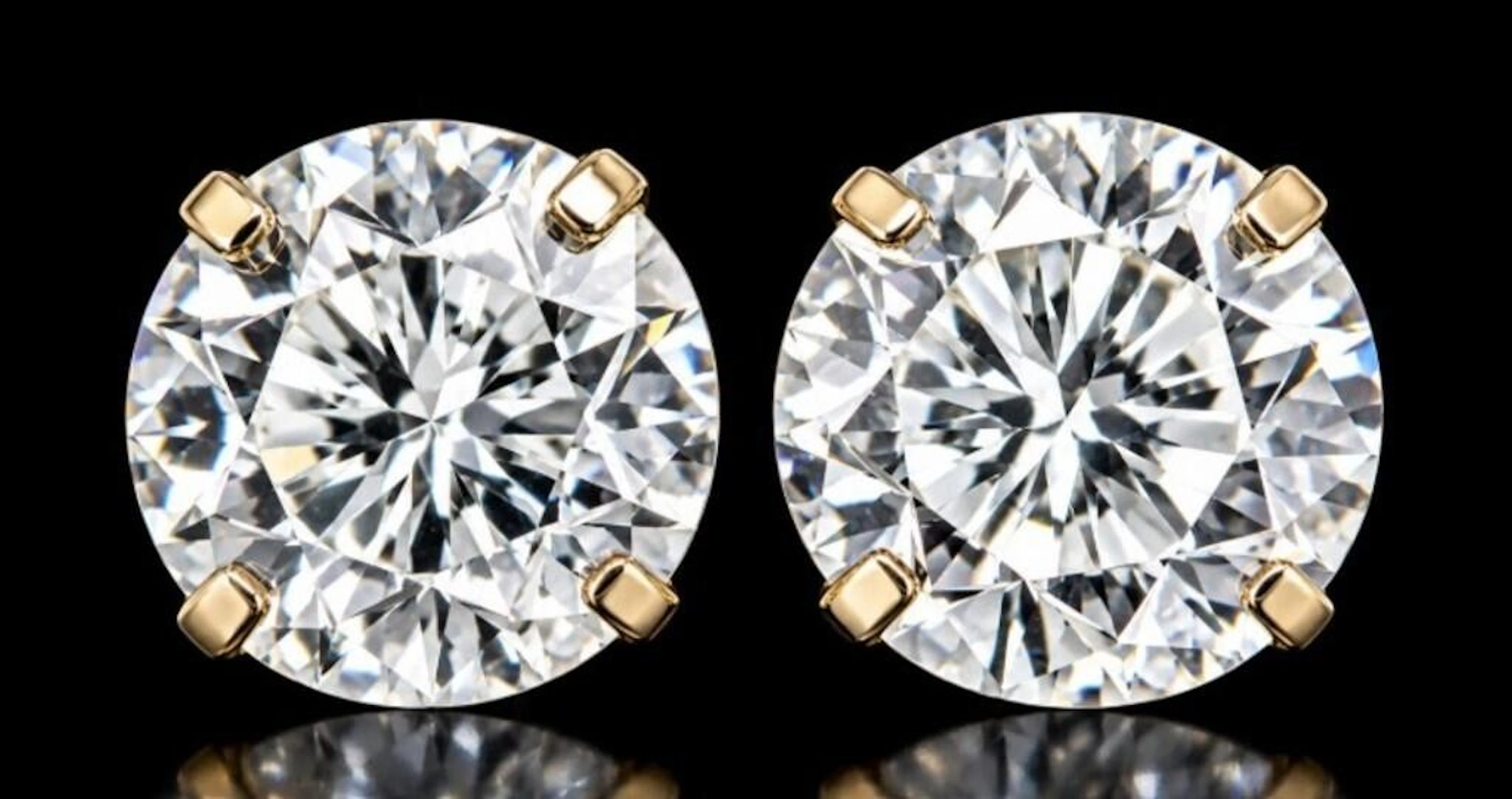 $1000, 14k(0.41g), lab diamond (0.84ct)earing, ret