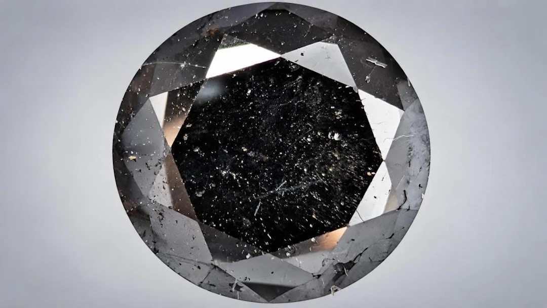 $2000, black diamond (5.3ct)gemstone, retail value