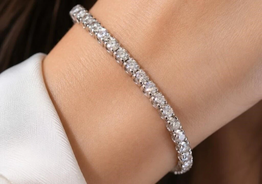 $5120, 14k(8.3g), diamond (1.5ct)bracelet 7", app