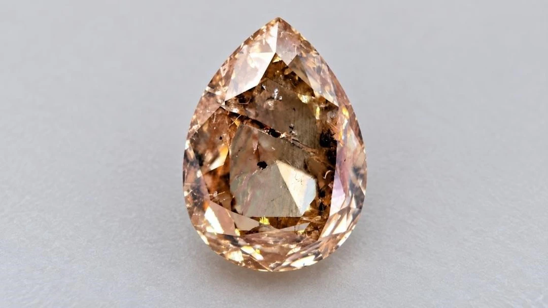 $2400, natural diamond (0.6ct)gemstone, retail val