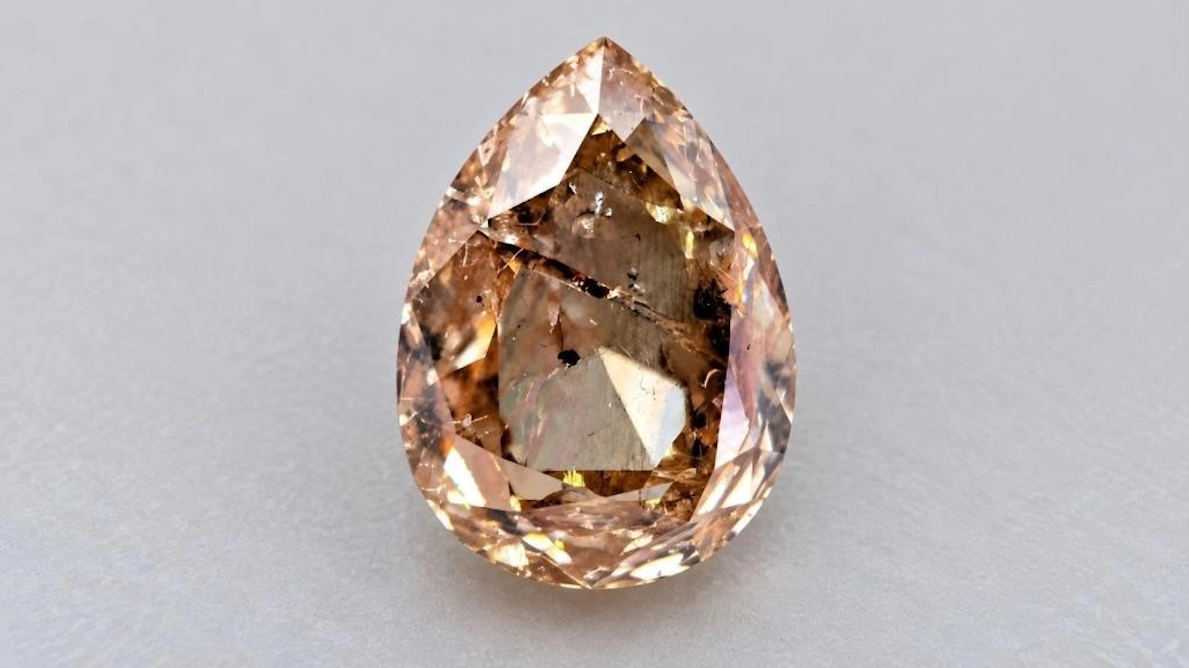 $2400, natural diamond (0.6ct)gemstone, retail val