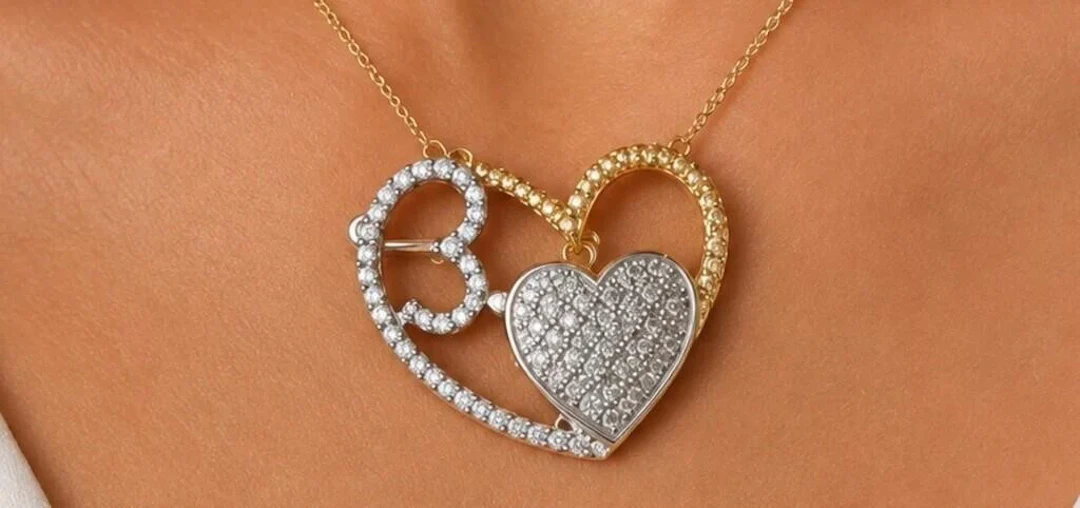 $2600 10K (1.74g), 0.20ct diamond pendant.
