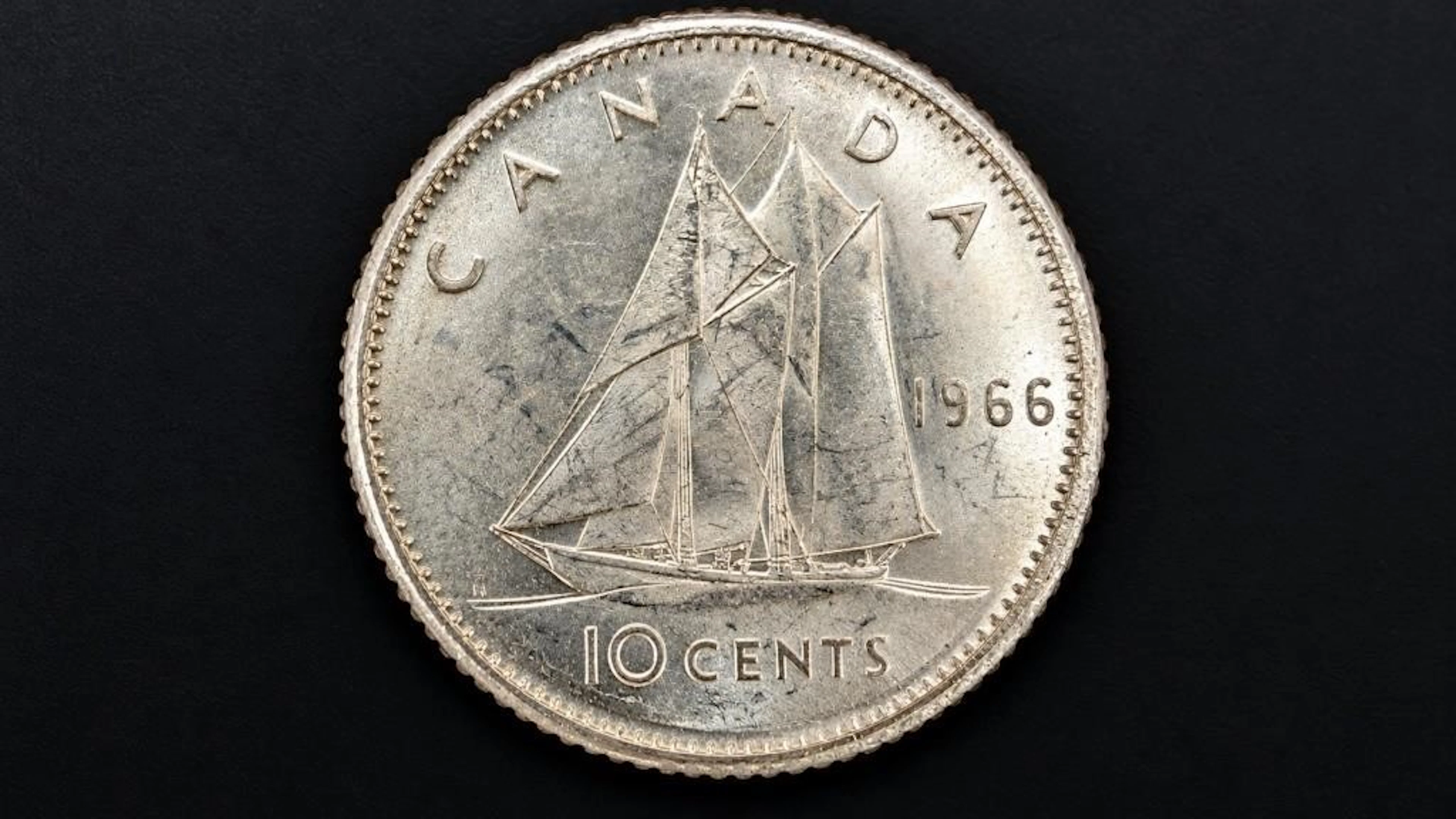 ., silver(2.34g), 10cent (random date) coin, reta