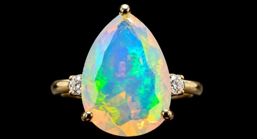 $2400, 10k(1.7g), opal (2.2ct)ring, size 6, retail