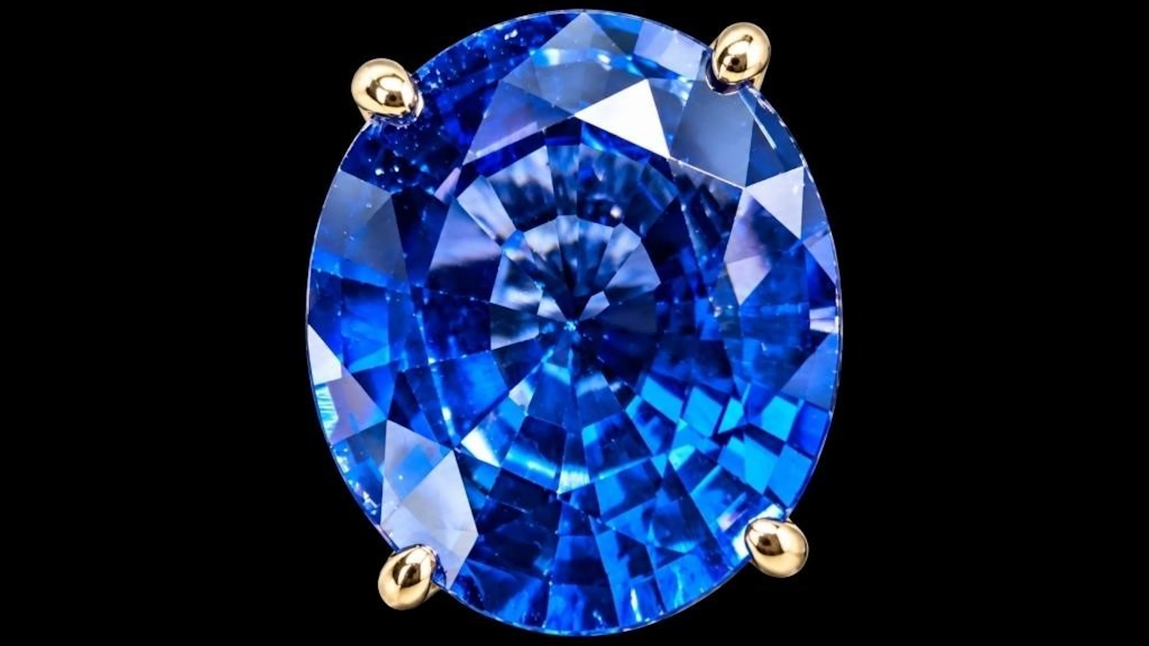 $3600, 10k(4.1g), lab sapphire (14.1ct)ring, size