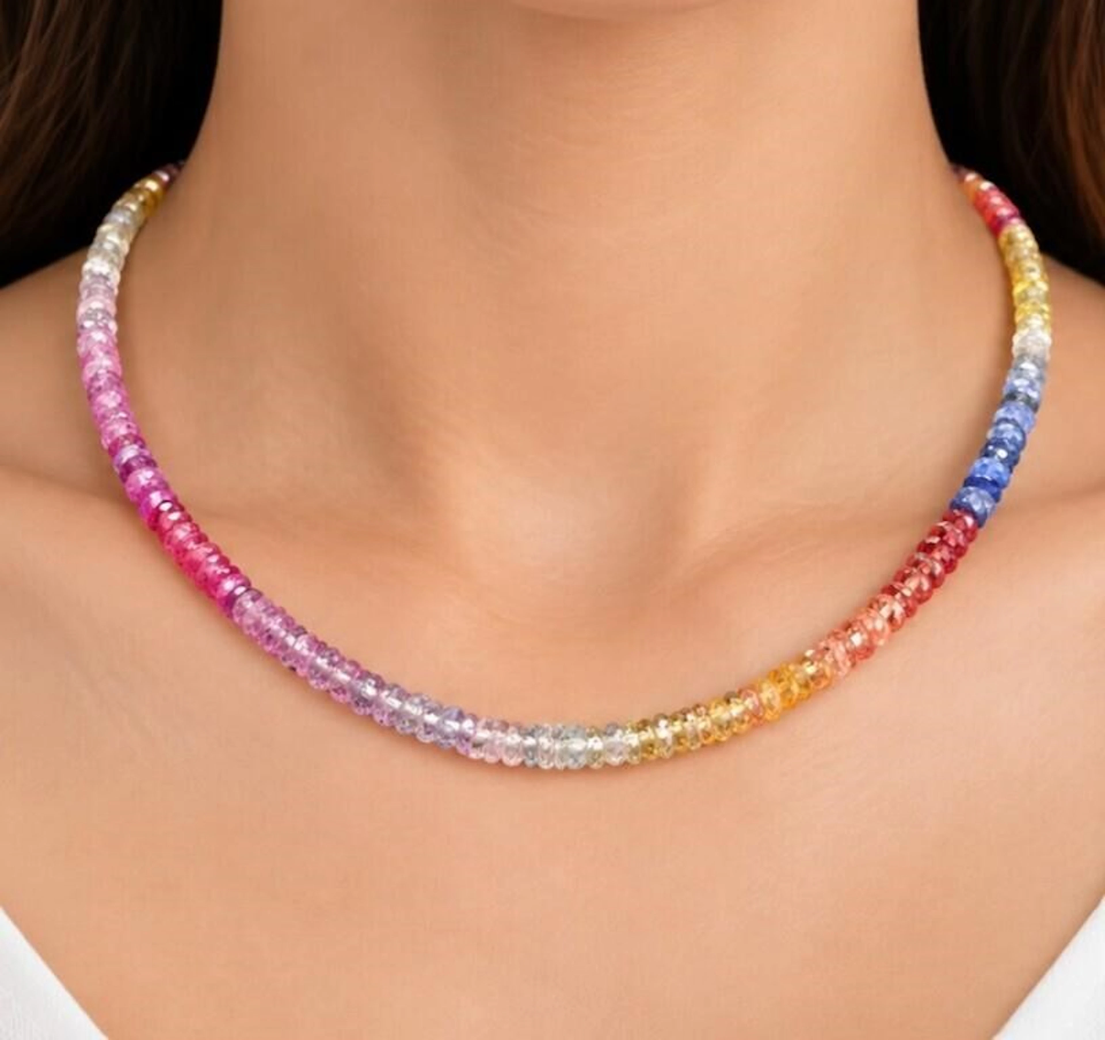 $1800, silver(9.6g), fancy color sapphires (46ct)n