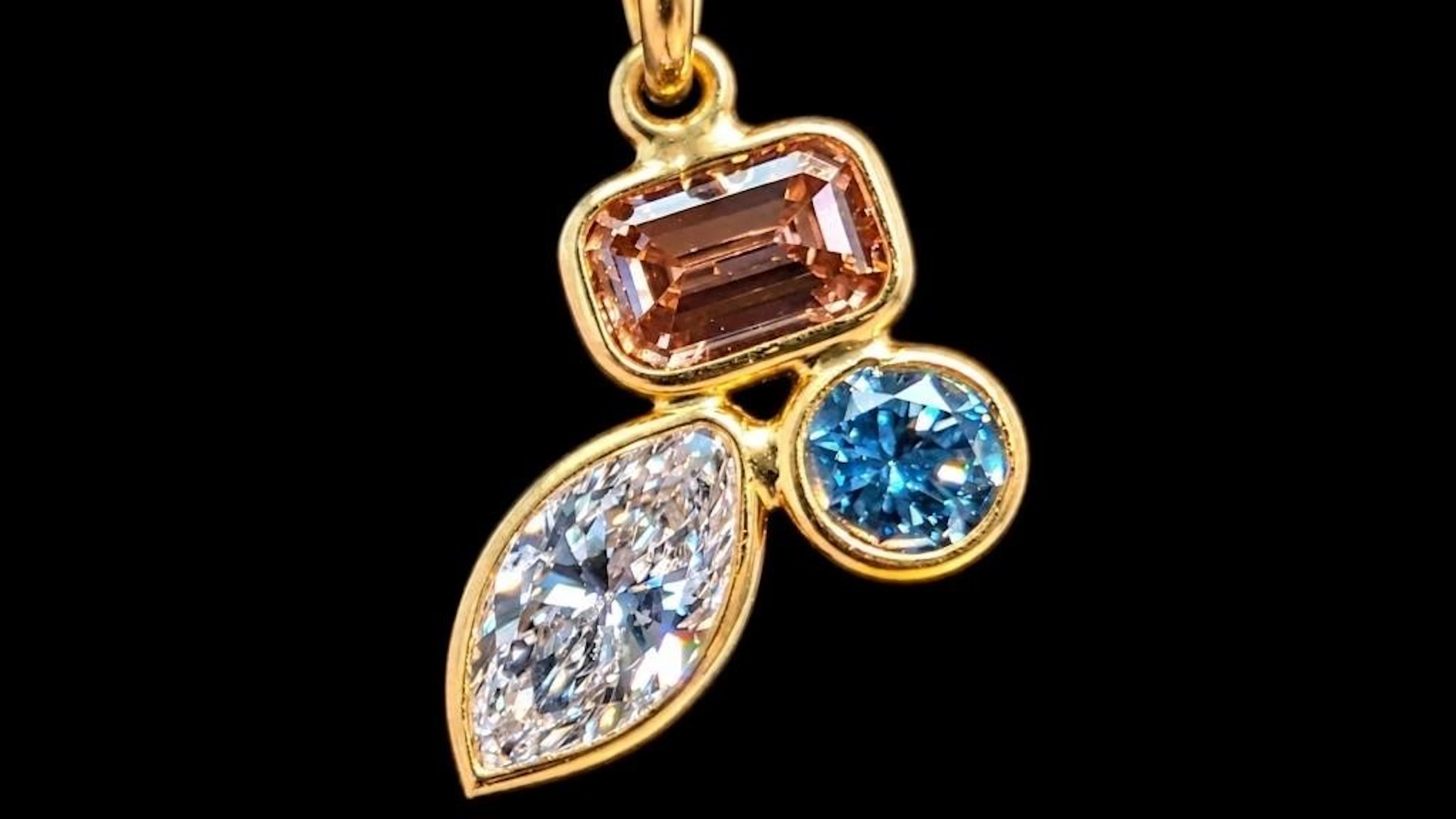 $780, 14k(0.38g), fancy lab diamond (0.54ct)pendan
