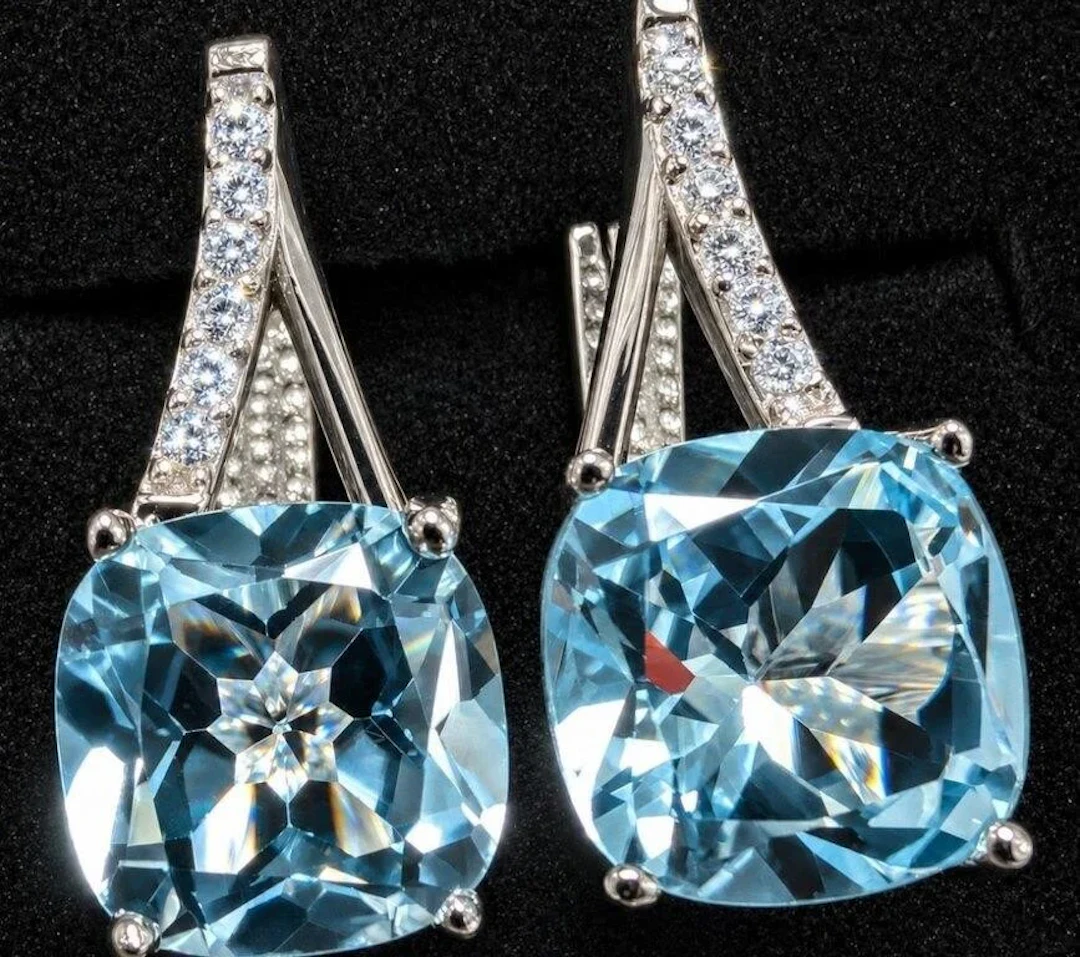 $4000, 10k(4g), blue topaz (5ct), cz (0.06ct) ear