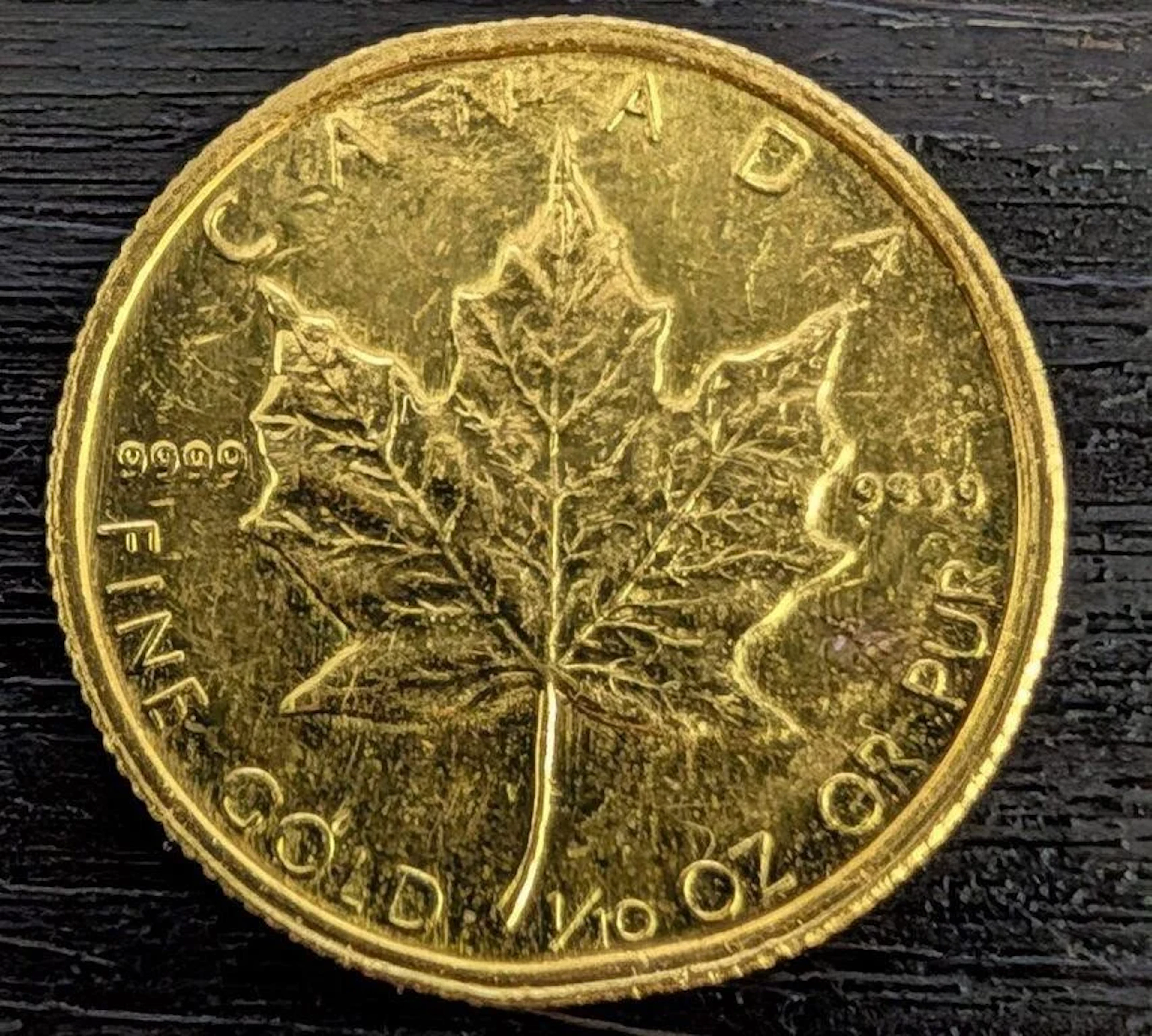 24k(3.11g), maple leaf 1985 coin