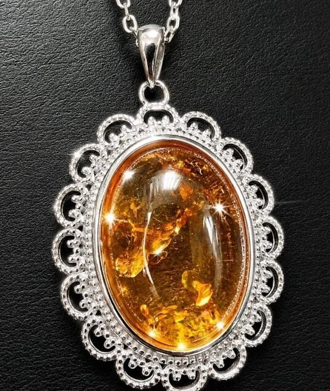 $360, silver(6.09g), amber neckalce 16-18", reta