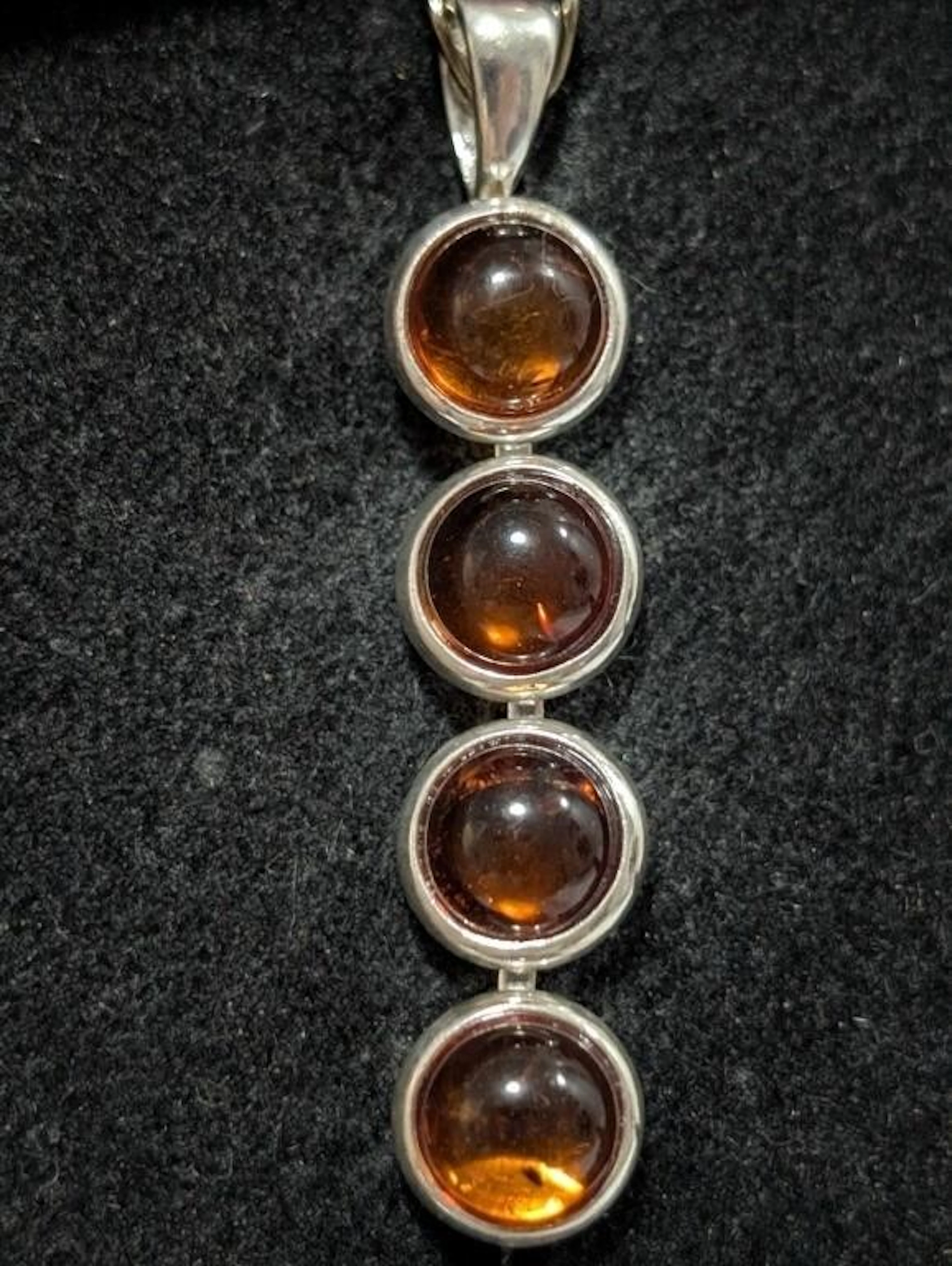 $130, Silver(5.19g), AmberPendant, appraised/retai