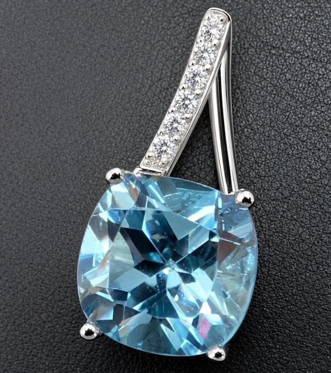 $2400, 10k(1.48g), blue topaz (2.5ct), cz (0.05ct