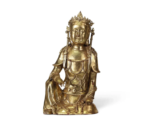 CHINA — A gilded porcelain statuette of Guanyin, depicted se - Lot 30