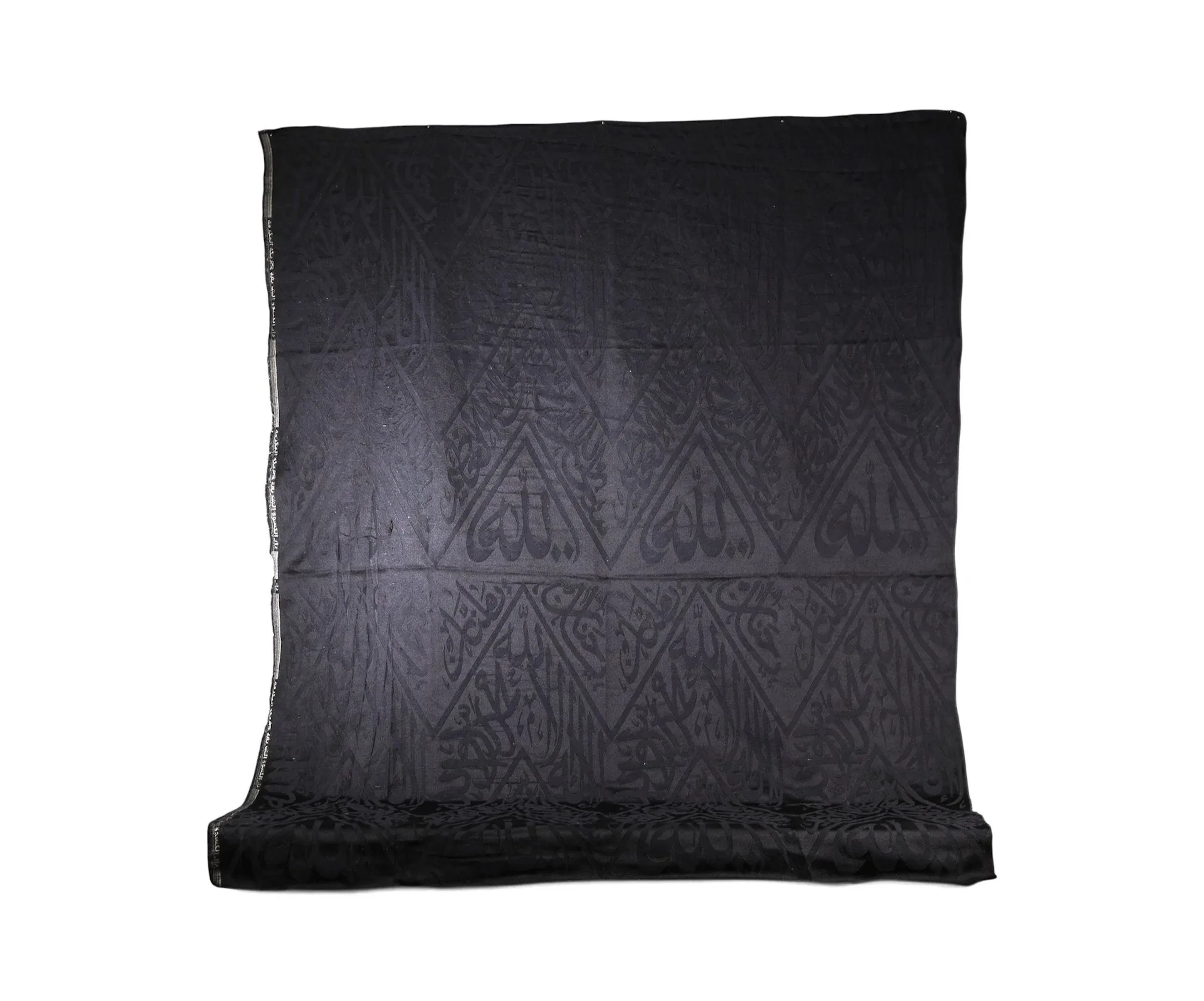 BLACK CALLIGRAPHIC TEXTILE FRAGMENT FROM KISWAH, SAUDI ARABI - Lot 117