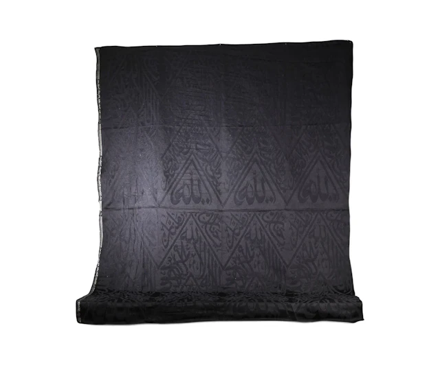 BLACK CALLIGRAPHIC TEXTILE FRAGMENT FROM KISWAH, SAUDI ARABI - Lot 117