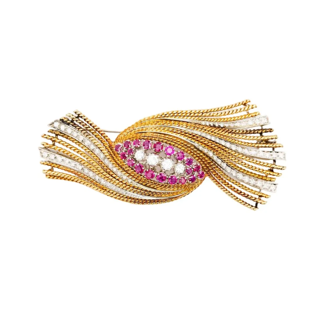 Brooch Pin in white gold, yellow gold, ruby and diamonds.