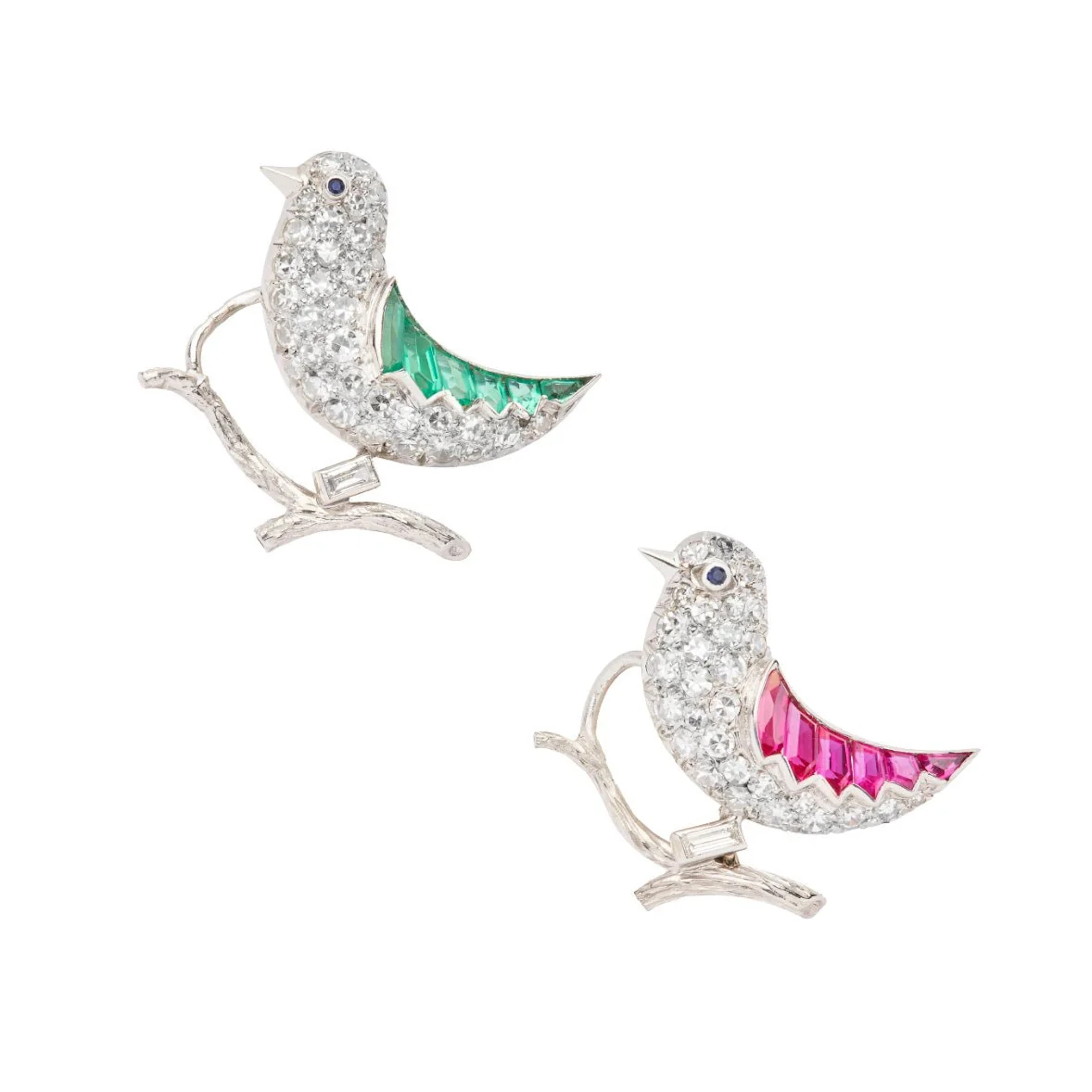 Two "Birds" brooches in white gold, Platinum, Rubies, Emeralds, and Sapphires