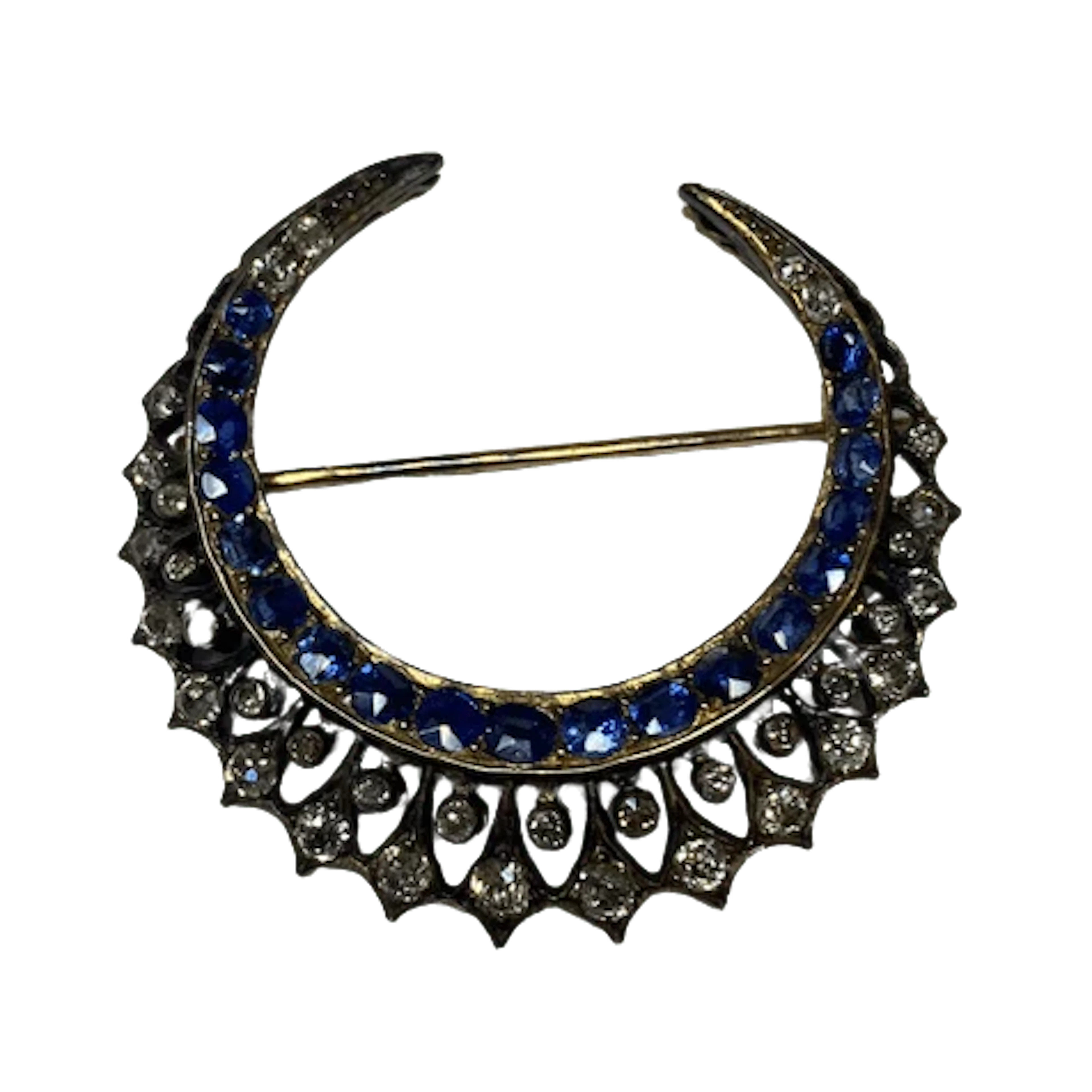 Brooch made of yellow gold, silver, sapphires, and diamonds