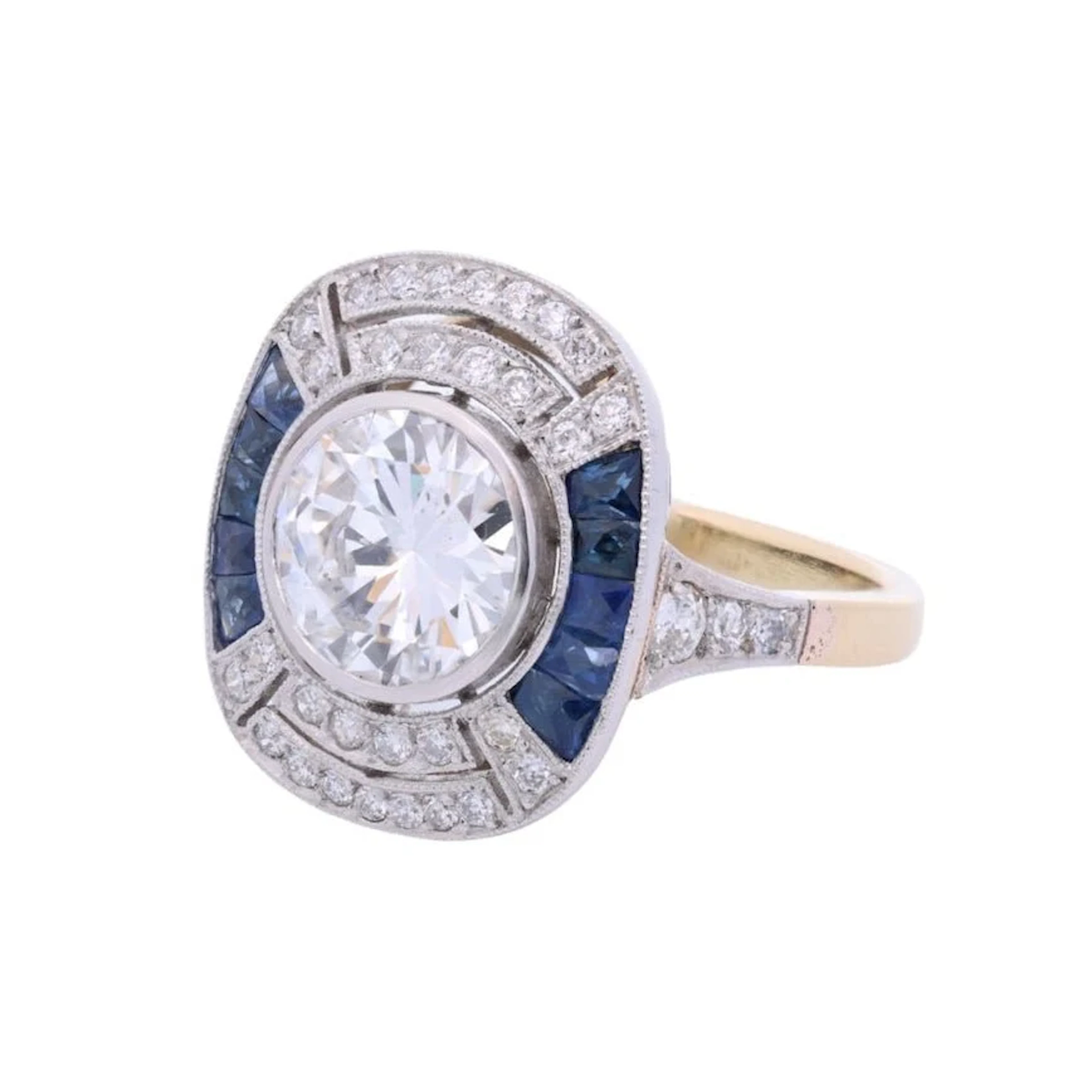 Entourage Ring in Platinum, Sapphire, and Diamonds