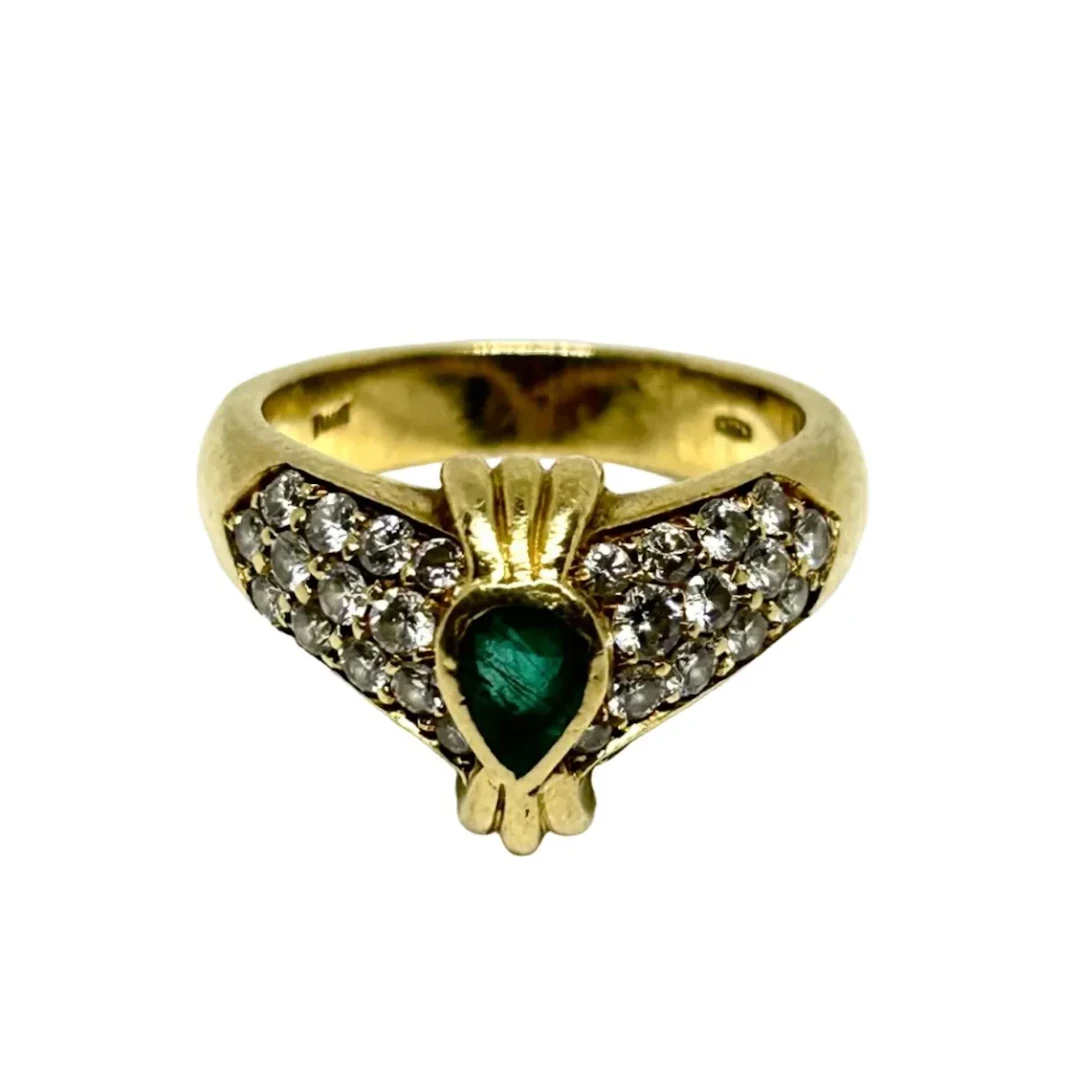 PIAGET ring in yellow gold, Emerald, and Diamonds