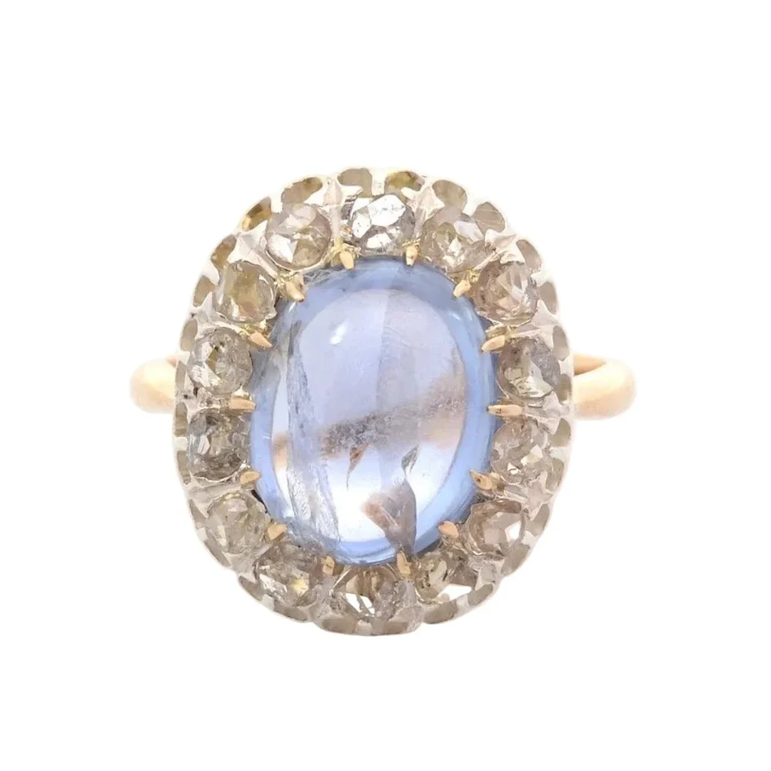 Ring Surroundings in yellow gold, paltinium, sapphire and diamonds