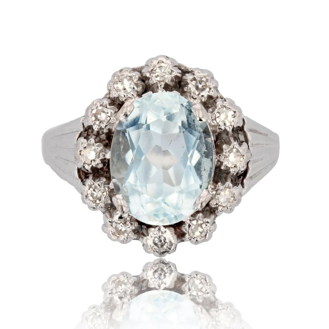 Entourage ring in white gold, platinum, aquamarine and diamonds