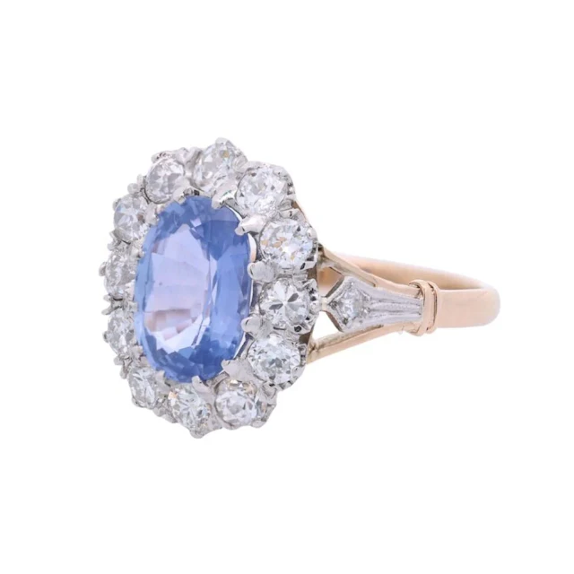 Bague Marguerite en or jaune, platine, saphir et diamants