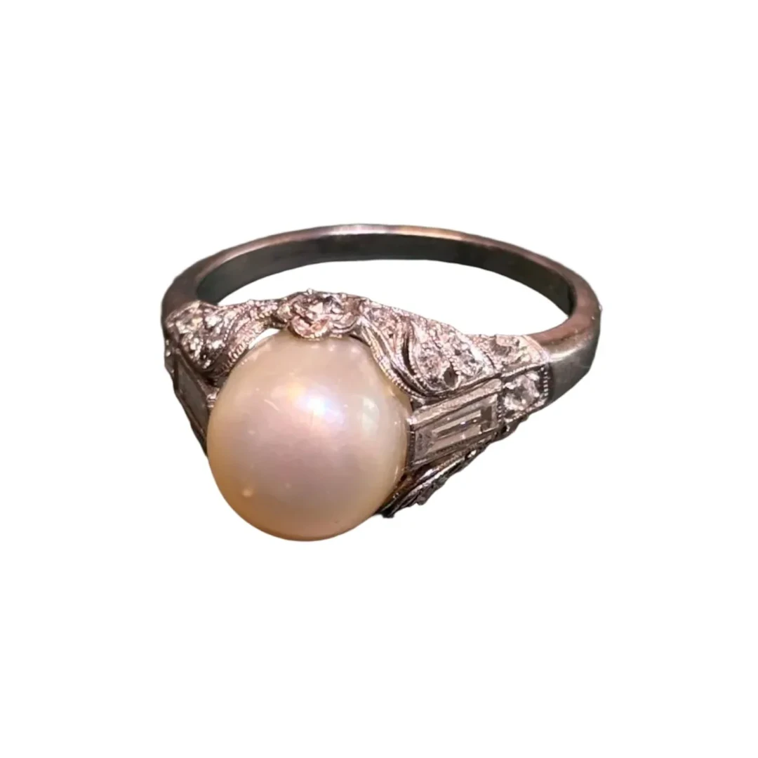 Platinum, pearl, and diamond ring