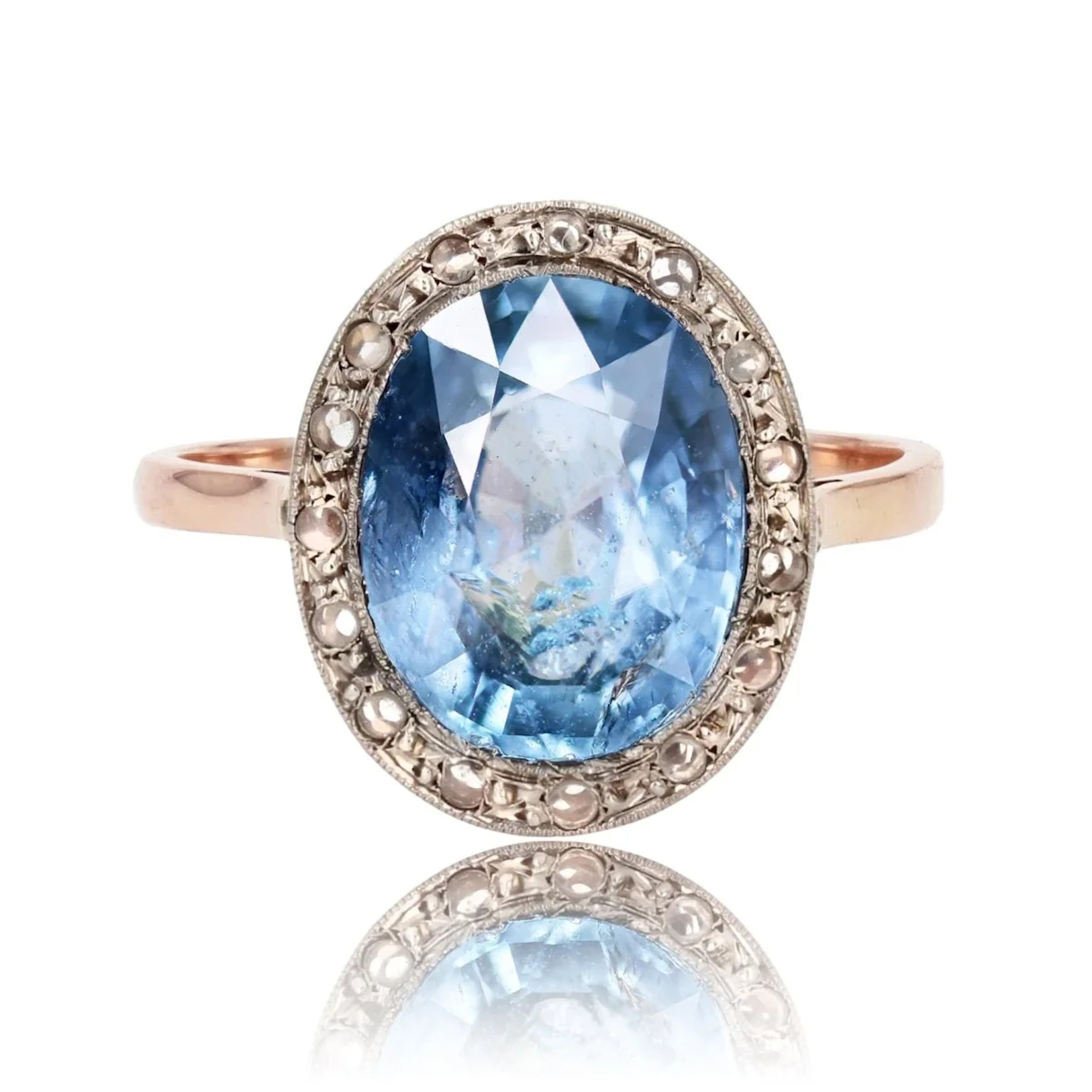 Ring Surroundings in rose gold, paltinium, sapphire and diamonds