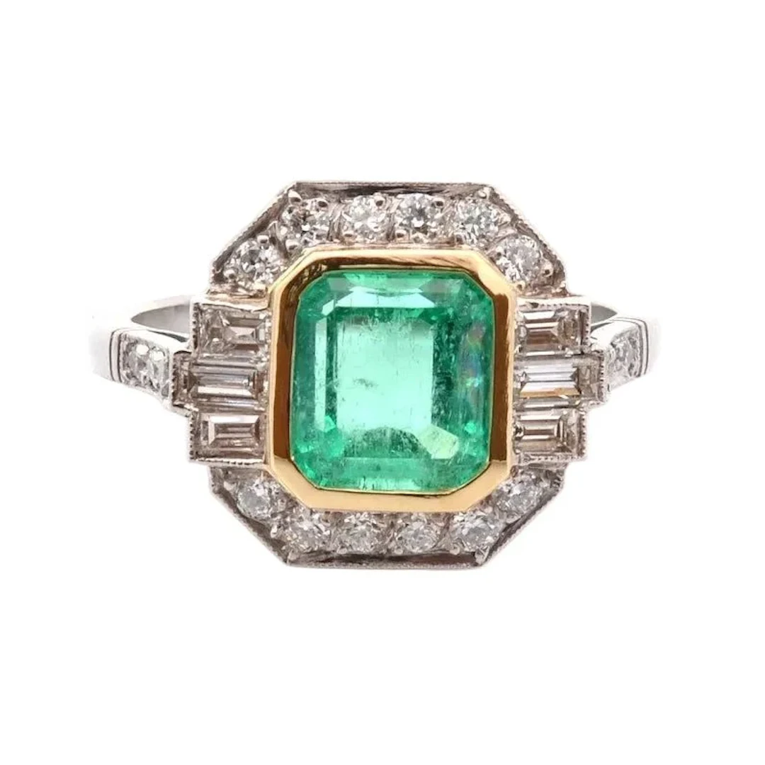 Ring Surroundings in yellow gold, paltinium, emerald and diamonds