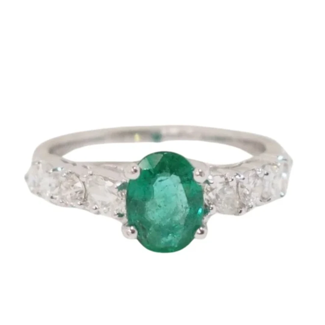White gold, emerald and diamond ring