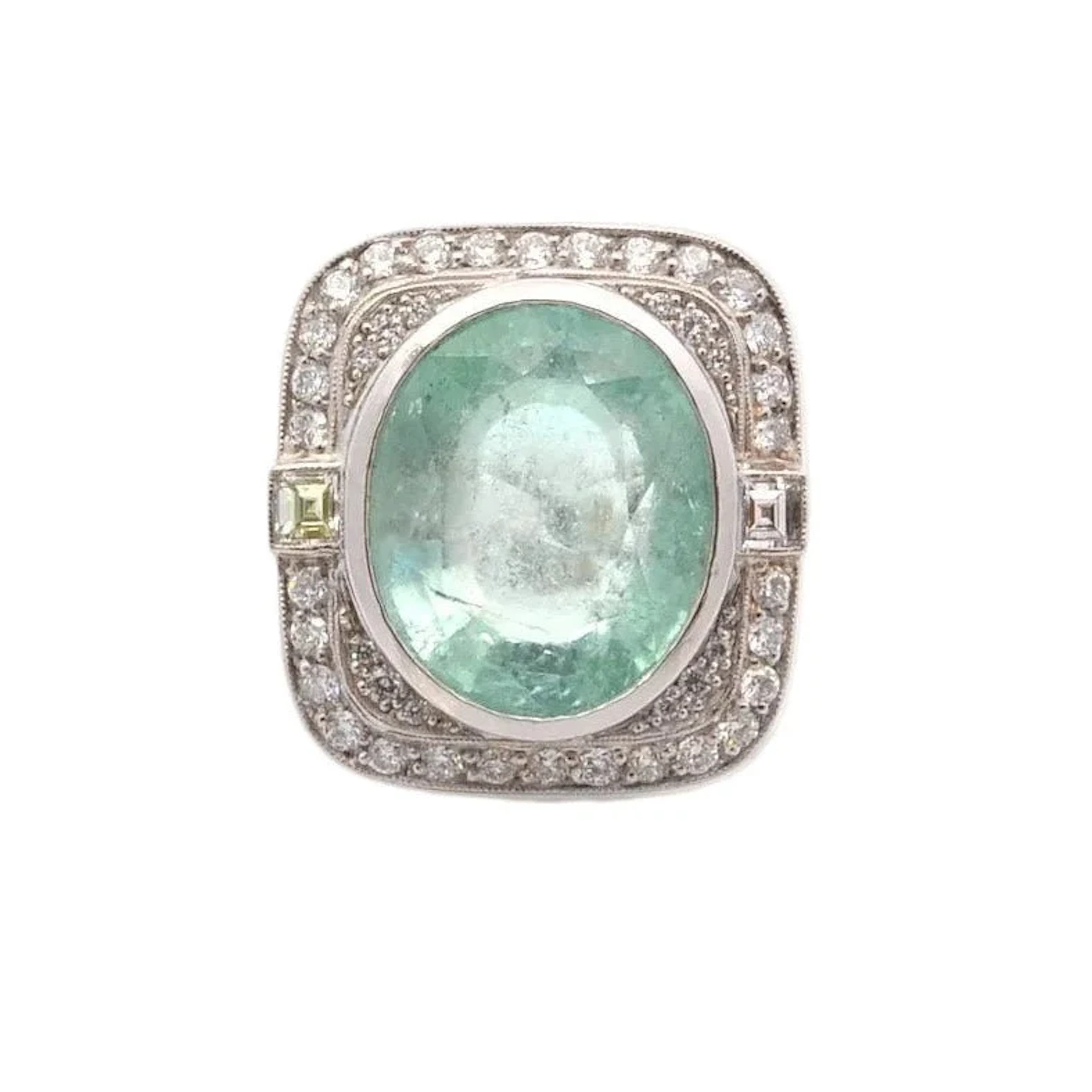 Ring Surroundings in paltinium, emerald and diamonds