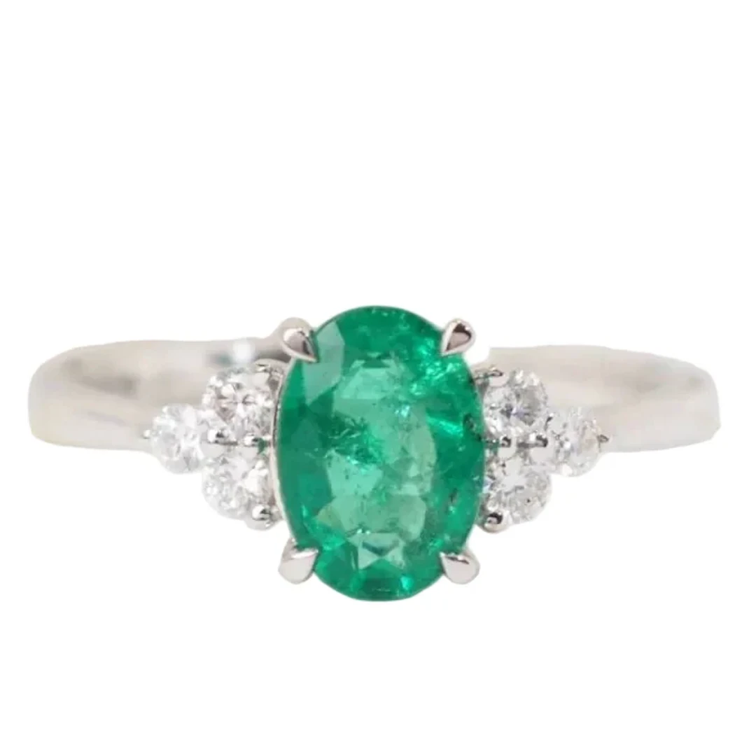 Ring Trilogy in white gold, emerald and diamonds