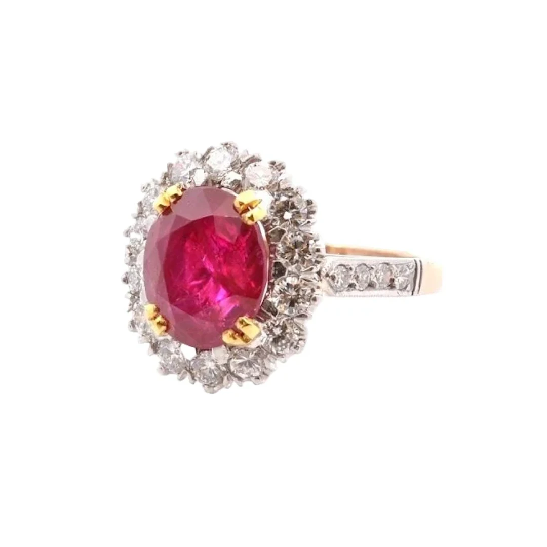 Daisy ring in platinum, rose gold, rubies, and diamonds