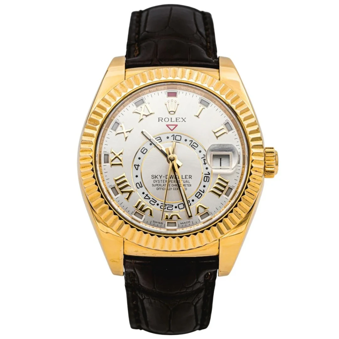 Montre ROLEX "Sky-Dweller" en or jaune, argent, cuir et saphir